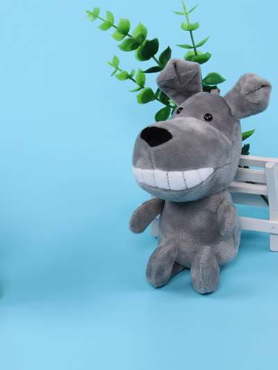 Модний брелок мяка іграшка собака що посміхається сірий. Зображення товару, вид 3