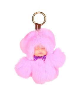 Модний брелок лялька в хутрі рожевий. Зображення товару, вид 1