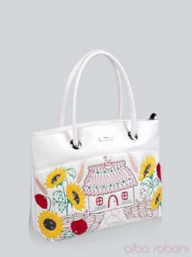 Стильна сумка з вышивкою, модель 141143 білий. Зображення товару, вид збоку.